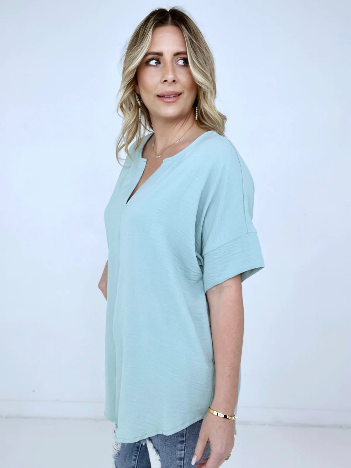 Woven Airflow Split Neck Short Sleeve Top