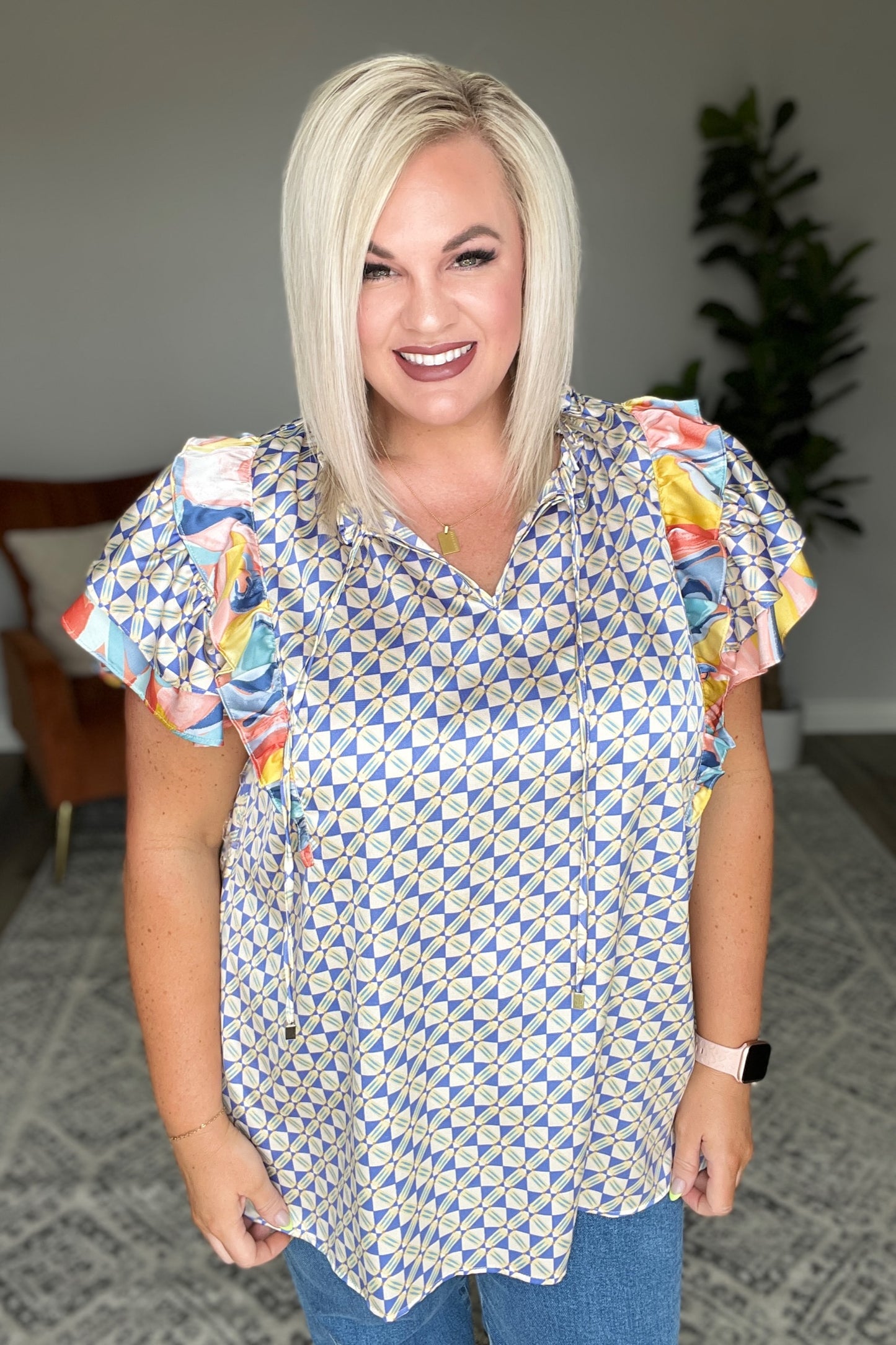 Merry Go Round Flutter Sleeve Top
