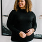 Nivia Draped Turtle Neck Tunic in Black
