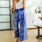 PREORDER: Smocked Tulip Hem Pants in Assorted Prints