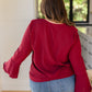 A Flare And A Bow Top