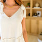 All Tied Up Peplum Tank