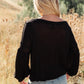 Bellissimo Draped V-Neck Sweater in Black