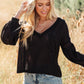 Bellissimo Draped V-Neck Sweater in Black
