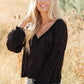Bellissimo Draped V-Neck Sweater in Black