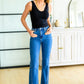 Risen High Rise Split Hem Straight Jeans