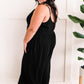 Button Down Jumpsuit In Natural Black