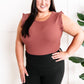 Sleeveless Ruffle Bodysuit In Dusty Mauve