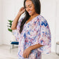 Fabled in Floral Draped Peplum Top in Blue