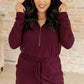 Getting Out Long Sleeve Hoodie Romper in Maroon