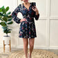 Long Sleeve Surplice Dress With Attached Shorts In Navy Florals 11.20