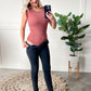 Sleeveless Ruffle Bodysuit In Dusty Mauve