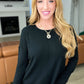 Front Seam Round Neck Sweater in Black
