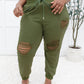 Kick Back Distressed Joggers In Olive