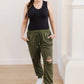 Kick Back Distressed Joggers In Olive