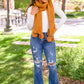 Knitted Fuzzy Pom Pom Scarf In Ginger