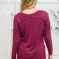 Long Sleeve Knit Top With Pocket In Burgundy