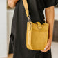 Millie Mini Nylon Crossbody Bag in Mustard