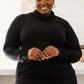 Nivia Draped Turtle Neck Tunic in Black