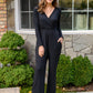 Onward & Upward Faux Wrap Jumpsuit In Black