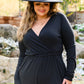 Onward & Upward Faux Wrap Jumpsuit In Black