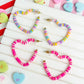 PREORDER: Rubber Disc Open Heart Hoop Earrings in Two Colors