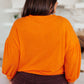 Subway Station Sweater in Orange