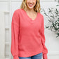Wide V Neck Waffle Knit Sweater In Rose