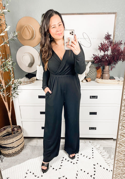 Onward & Upward Faux Wrap Jumpsuit In Black